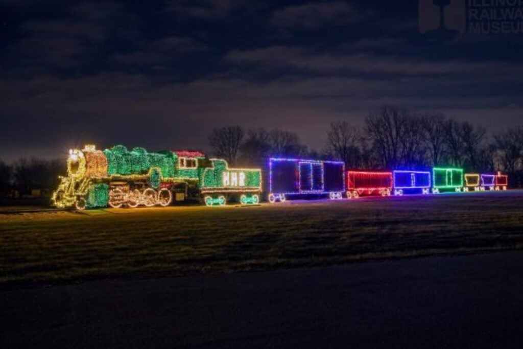 Families riding Happy Holiday Railway at Illinois Railway Museum in Union Illinois with Santa