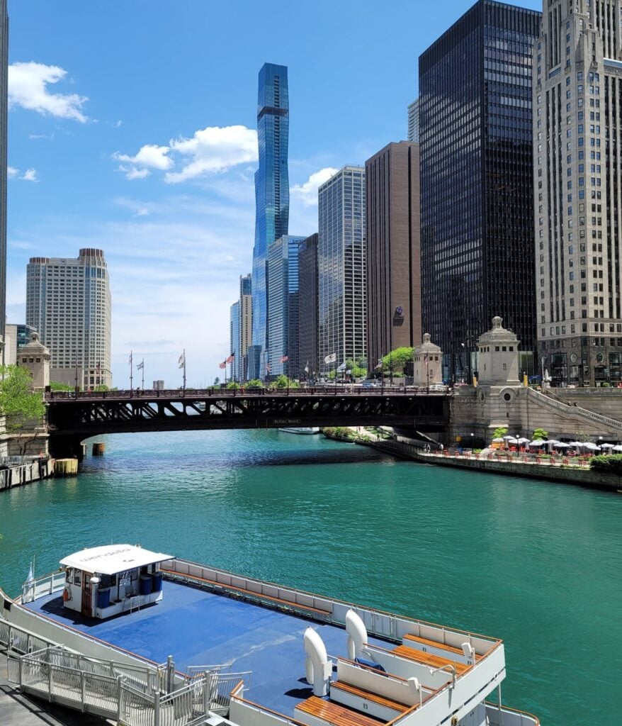 Chicago River architecture boat tour with skyline and downtown buildings