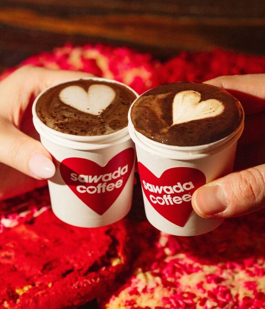 two cups of coffee with hearts in them