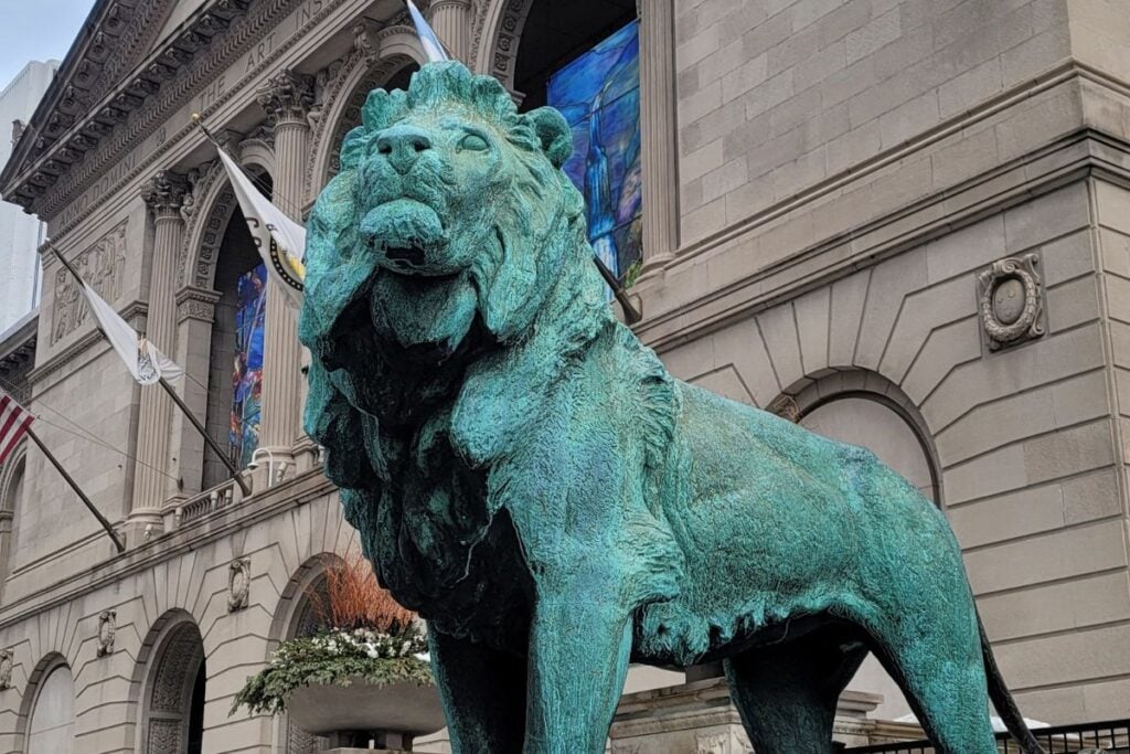 Bronze lion statue outside the Art Institute of Chicago at the museum’s main entrance