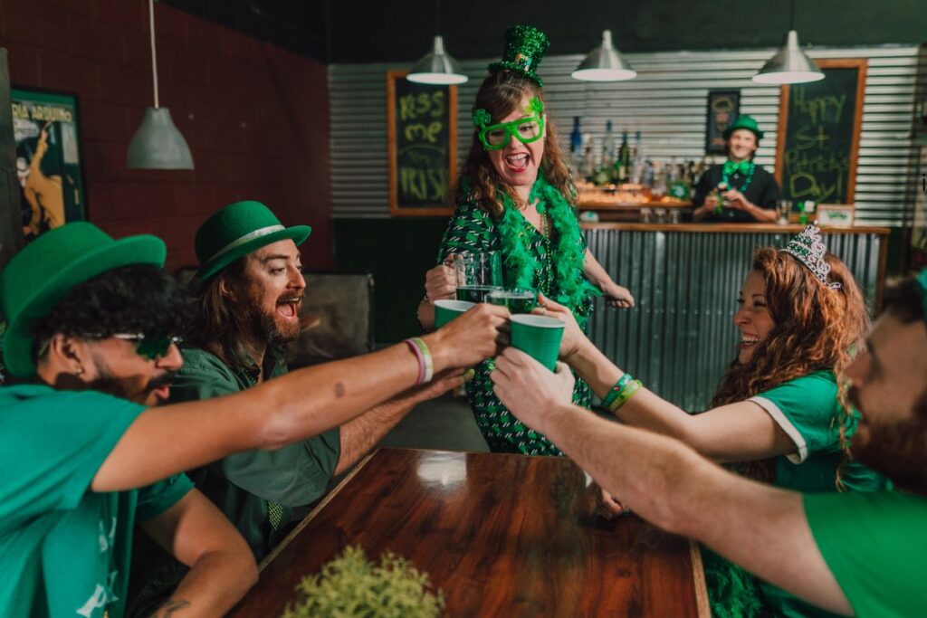 people celebrating st. patricks day in chicago