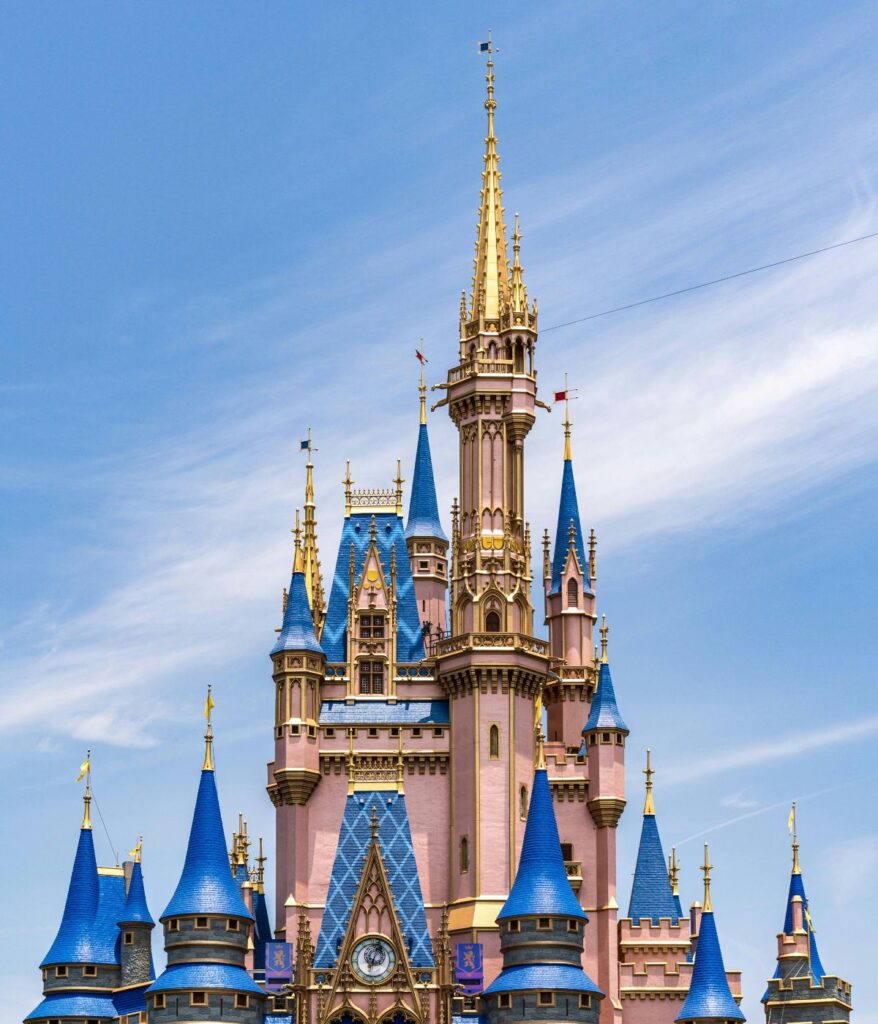 Cinderella Castle at Magic Kingdom Walt Disney World with Disney characters performing on stage in front