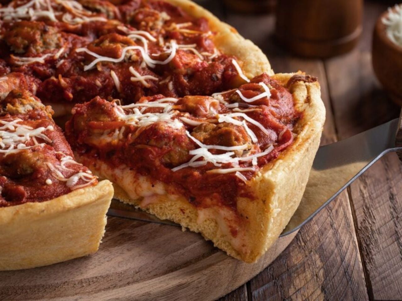 Chicago deep dish pizza with cheese and toppings