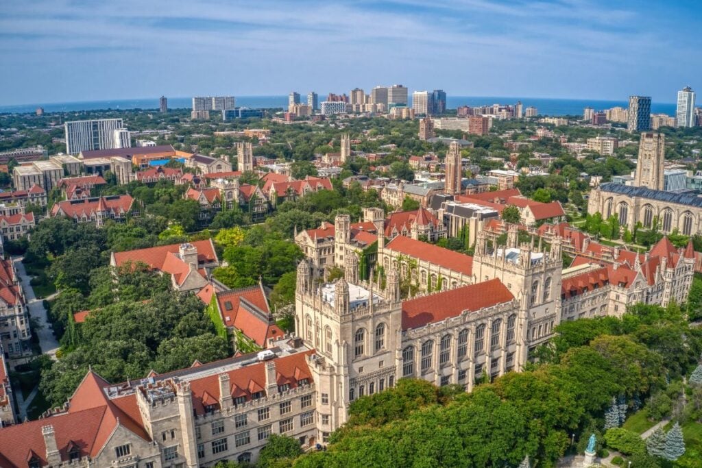 Aerial view of the University of Chicago's Gothic campus in Hyde Park with Lake Michigan beyond
