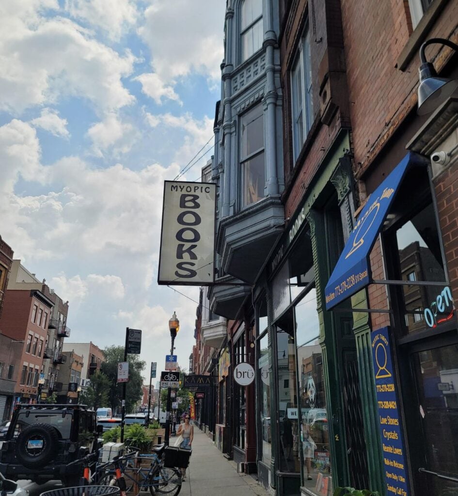 Myopic Books sign and shops along Milwaukee Avenue in Chicago's Wicker Park neighborhood