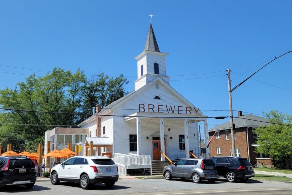 Beer Church Brewing Co. in a restored white church with steeple in downtown New Buffalo, Michigan