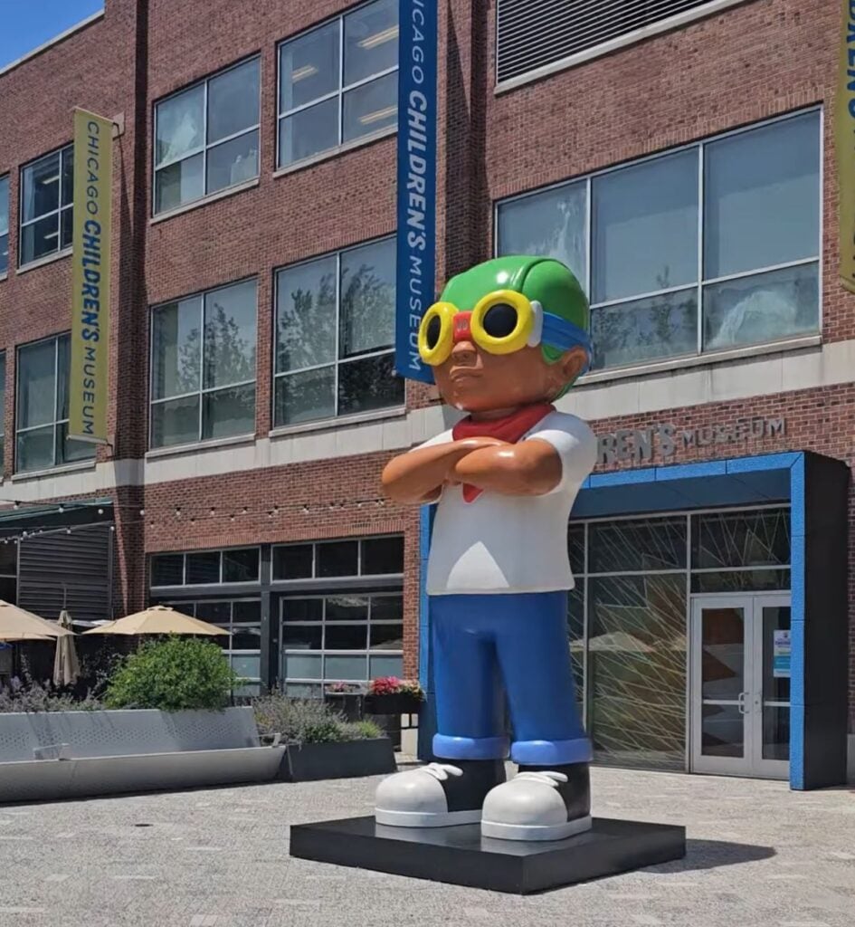 Sculpture of a child in goggles outside the Chicago Children's Museum entrance at Navy Pier