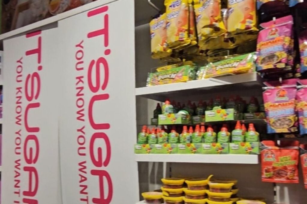 Candy displays and branded signage inside the IT'SUGAR candy store on Michigan Avenue in Chicago